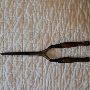 Vintage curling iron with wooden handles